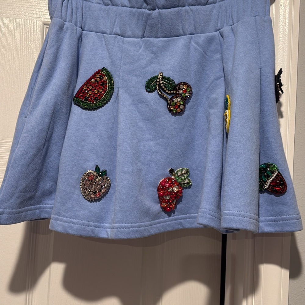 QUEEN OF SPARKLES Light Blue Skater Skirt with Fruit Gem Embellishments
